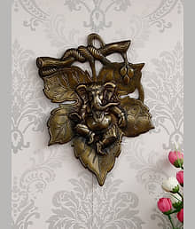 eCraftIndia Brown Antique Finish Lord Ganesha On Creative Leaf Handcrafted Metal Wall Hanging