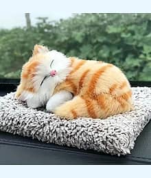 Shukaam Sleeping Cat Soft Toys with Sound for Car Dashboard Cat & Office Desk Decorative Showpiece - 18 cm (Resin, Orange)