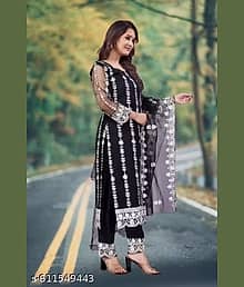 rajvitrade Women Net Embroidered Straight Kurti With Pants ( Black )